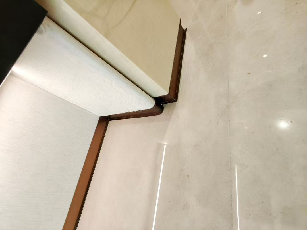 Metal door surround corner detail