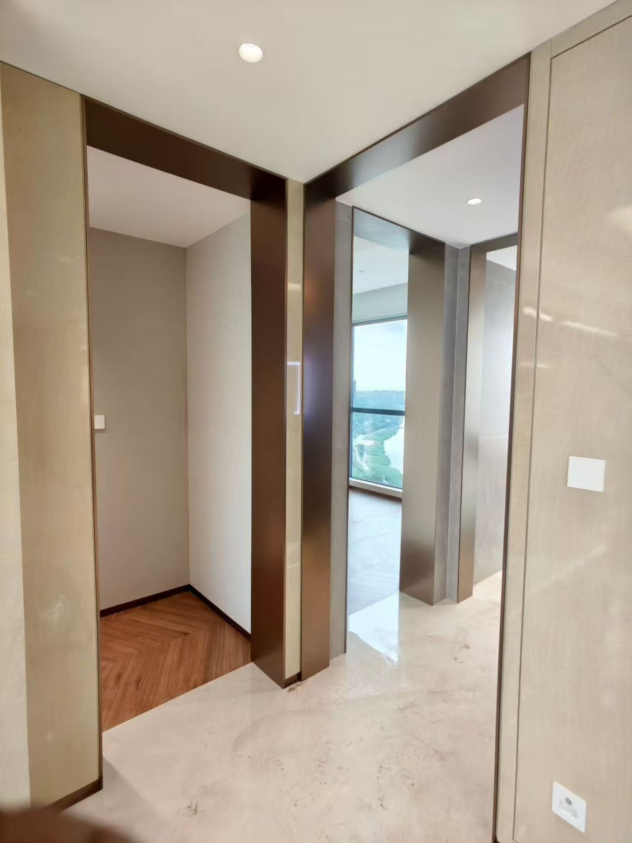 Champagne gold and bronze residential door surround installation