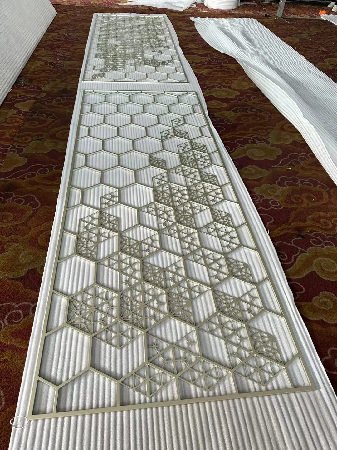 Laser-cut stainless steel screen with a custom decorative pattern 2