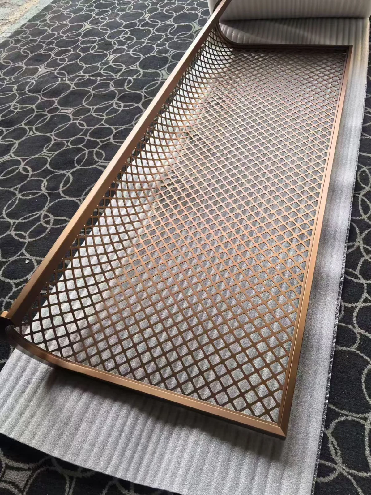 Laser-cut stainless steel screen with a custom decorative pattern 5