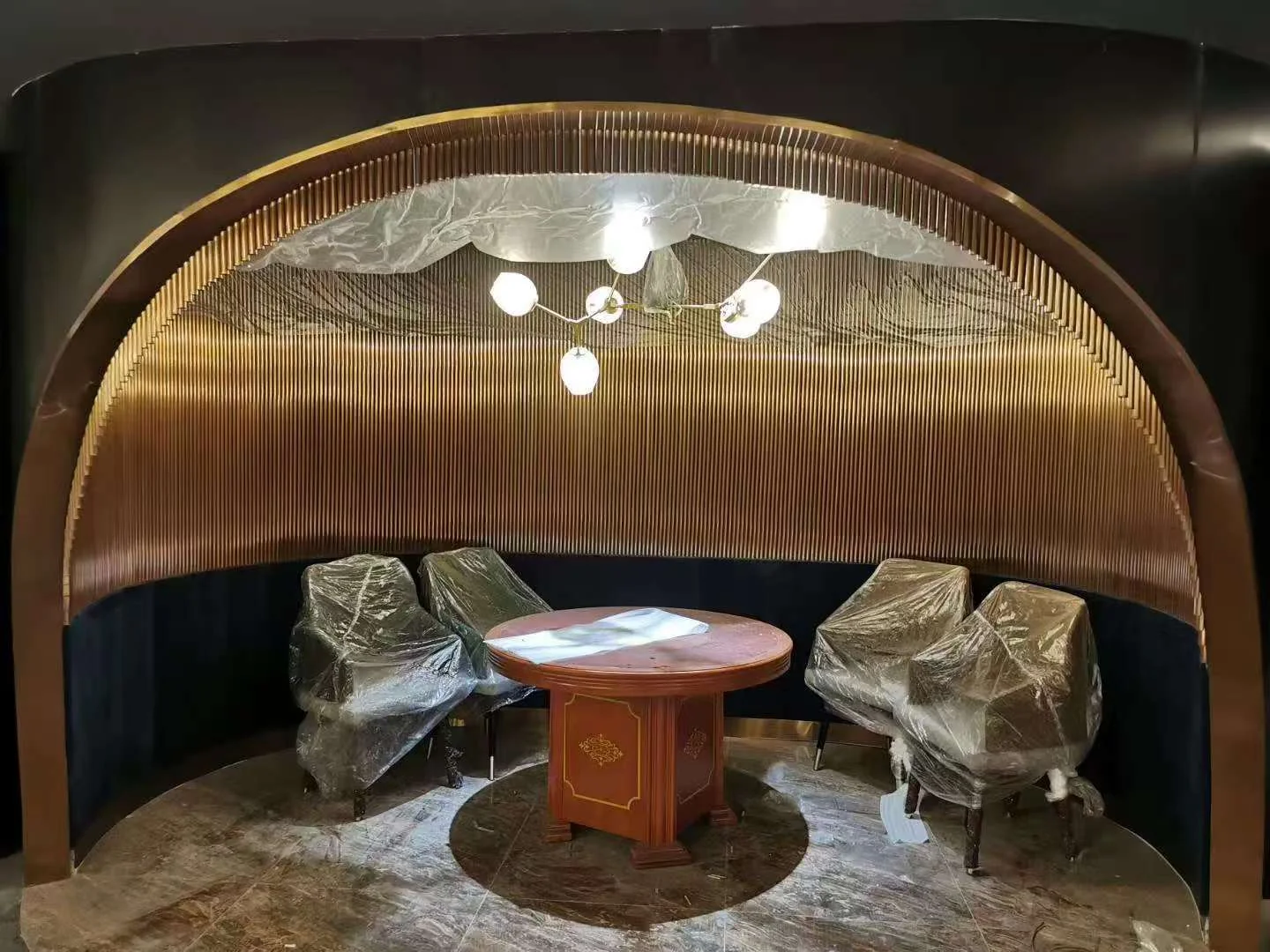 Hospitality project curved stainless steel dining booth